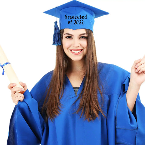 Graduate wearing cap decorated with 'Graduated of 2022' in black letters, showcasing use of Massive 576 Piece Self Adhesive Vinyl Letter Sticker Set