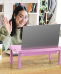 Woman using laptop on Pink Monitor Stand With Storage, Desk Riser And Laptop Elevation, 3 Height Adjustable Levels