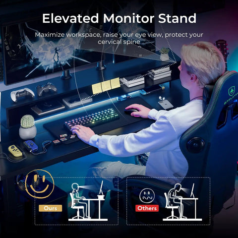 User using Electric Standing Desk with Drawers 48 by 24 Inch Height Adjustable Gaming Desk, elevated monitor stand visible