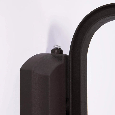 Side view of Outdoor Hex Wall Lantern Dusk To Dawn Sensor in rustic bronze cast aluminum with moisture blocking details