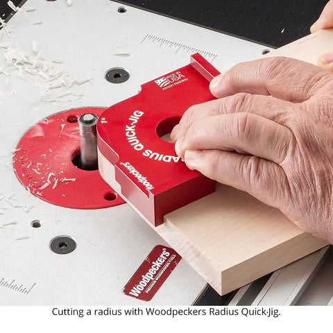Cutting a radius using the Shop Tested Street Smart Radius And Chamfer Quick Jig Deluxe Set on a router table.