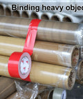 Two Pack Red Duct Tape Heavy Duty 9 Mil Thick 2 Inch By 30 Yard Roll binding heavy objects in a workshop.