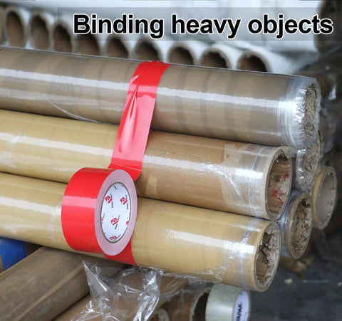 Two Pack Red Duct Tape Heavy Duty 9 Mil Thick 2 Inch By 30 Yard Roll binding heavy objects in a workshop.