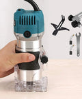Electric Wood Router Trimmer 800W Handheld Palm Router For Slotting And Carving 30000 RPM Aluminum Body With Soft Grip shown in use