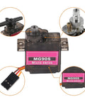 Close-up of MG90S Micro Servo Pack 8 Pack 180 Degree 9G Geared Servos showing metal gears, wiring, and MG90S micro servo label