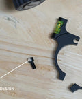 Rifle Scope Level Bubble For 30 Mm Tubes, Anti Cant Tool with single bolt design on wooden surface