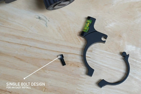 Rifle Scope Level Bubble For 30 Mm Tubes, Anti Cant Tool with single bolt design on wooden surface