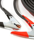 Twin Cable Battery Jumper Cables 16 Foot Long Heavy Duty Number 4 Copper Welding Cable With 500 Amp Clamps shown coiled on surface