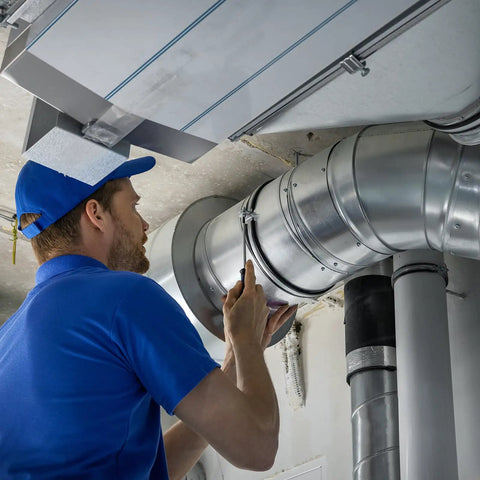 Technician installing 90mm 3.5 Inch Duct Connector Galvanized Steel Duct Coupling Vent Coupler With Clamps For HVAC Exhaust Fans And Dryer Vent Systems Hose Extension 4 Inch Long Durable Silver Tone on ducting