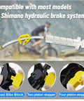 Shimano Hydraulic Brake Bleed Kit For Disc Brakes with syringe, adapters, and blocks for mountain and road bikes.