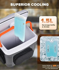 32 Quart Electric Car Cooler Warmer With Smooth Rolling Wheels Keeps Food And Drinks Ice Cold showing 1.5L beverage bottle and divider.