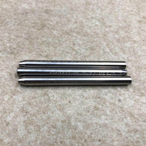 Three stainless steel waterjet focusing nozzles, 6.35×1.02×76.2 mm, flat lay.