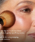 Applying Starter Beauty Kit With Best Of The Best Baked Face Palette using Retractable Angled Kabuki Brush on cheek