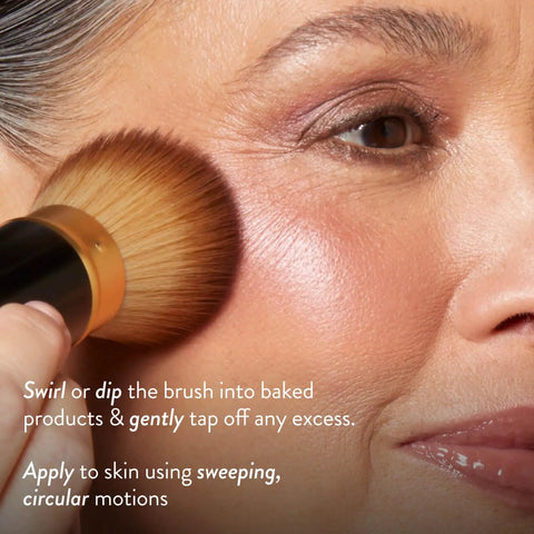 Applying Starter Beauty Kit With Best Of The Best Baked Face Palette using Retractable Angled Kabuki Brush on cheek