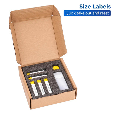 Open box displaying Pro Grade One Quarter Inch CNC Router Bits Kit with ER11 collet and various bit types secured in foam mold.