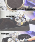 Automatic Electric Portafilter Cleaner And Knock Box For 58mm Espresso Handles cleaning spent coffee grounds from a portafilter.