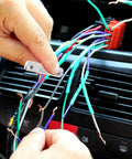 Hands replacing fuse in vintage car using European Type Classic Car Fuse Kit 60 Piece Set For Vintage Vehicles