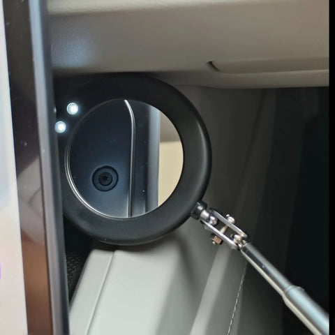 Telescoping Inspection Mirror With Two Lights, Circular And Square Mirrors, Flexible Reach And Extendable Handle, Rubber Grip For Auto, Home Workshop Or Shower Use, Go To Tool For Tight Spaces Black showing the mirror in use under a car dashboard.
