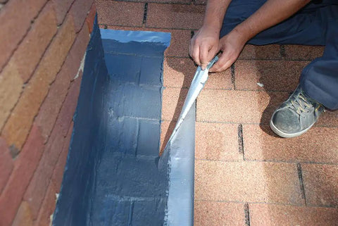 Applying Brushable Black Elastomeric Chimney Flashing Sealant For Waterproof Leak Protection Around Chimneys, Vents And Skylights