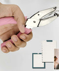 Handheld Circle Hole Punch One Ninth Inch Three Mm in use showing easy grip handle and punched papers for craft and office projects.