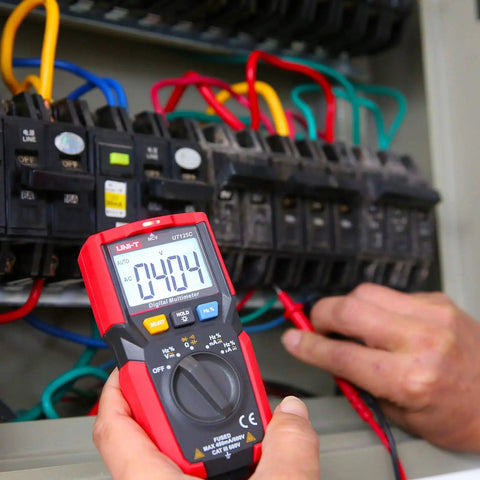 UT125C Pocket Digital Multimeter For DIYers And Pros 4000 Count Tester measuring voltage in electrical panel