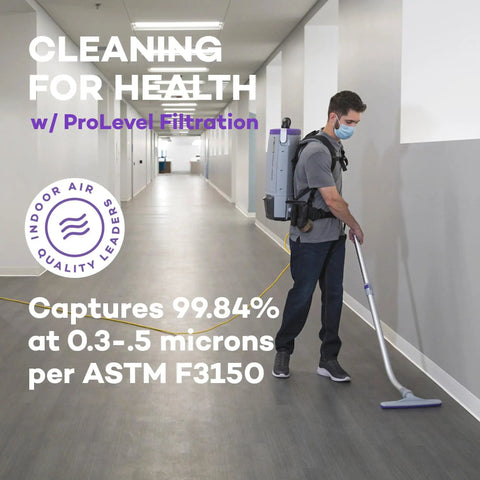 Person using vacuum with HEPA Replacement Filters Twin Pack for ProTeam vacuums for enhanced air quality and filtration efficiency.