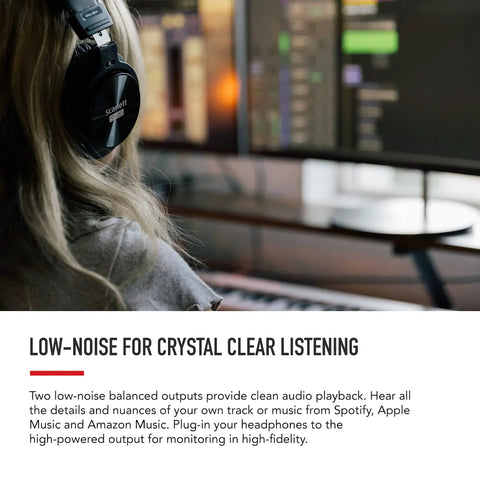 Scarlett Solo 3rd Gen USB Audio Interface setup with headphones and computer displaying audio software.