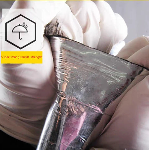 Close-up of Heavy Duty Self Adhesive Roof Flashing Tape And Waterproof Underlayment Roll showing aluminum foil backing for sealing leaks.