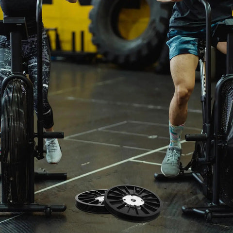 Exercise Bike Belt Discs For Workouts And Pulley System Dynamic Cycling Belt Wheel Home Gym Accessory on gym floor