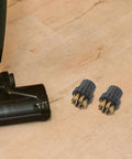 Set Of 6 Steam Cleaner Brush Heads Heavy Duty Copper And Nylon Detail Attachments on a wooden floor near a cleaning tool.