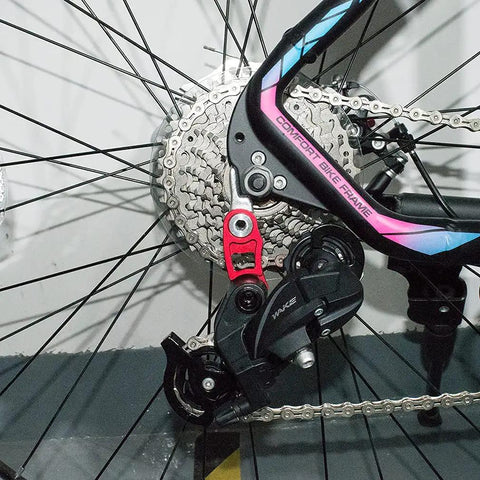 Rear Derailleur For Six To Eleven Speed Bicycles With Red Hanger Extender For Mountain And Road Bikes, shown on wheel