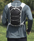 Back view of person wearing Women Running Vest With Hydration Bladder Pack For Hiking Cycling And Climbing Trail Ready Ultralight