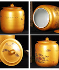 Gotta Love This Ceramic Rice Storage Jar For Keeping Pantry Staples Locked And Loaded Featuring An Airtight Dispenser Design That Seals In Flavor For Beans Oats And Coffee showing a decorative golden jar with a lid and intricate landscape designs.