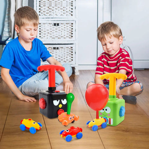 Boys playing with Balloon Launcher And Powered Car Set For Toddlers 3 To 5 Frog Theme STEM Toy Cool Racer Kit with pump.