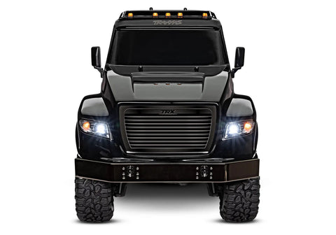 Front view of Beast 1-Tenth Scale 6WD RC Hauler With Pro Scale Winch, Ready-To-Drive Electric Flatbed Truck, headlights on.