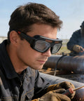 Close-up of Auto Darkening Welding Safety Glasses PC Wraparound Sweet Clarity Hard To Beat At The Big Box Store worn during welding.