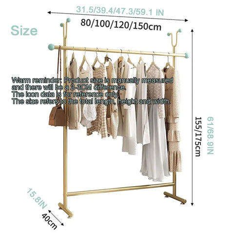 Beefy Heavy Duty Clothing Rack With Hooks For Home And Laundry Movable Clothes Rail In Gold Finish Industrial Style displaying clothes