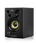 Close-up of DJMonitor 32 Active Studio Monitors with dual bass vent MDF cabinet and 3-inch woofer in black for home DJing.