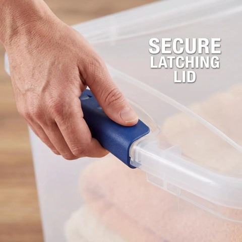 Hand securing the blue latching lid on Hella Tough 66 Quart Clear Plastic Storage Bins With Secure Twist Latches And Smart Stack Design.
