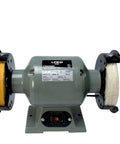 Grind Ready Buffing Wheels For Bench Grinders Set Of Two Six Inch Pads Half Inch Center Hole mounted on a bench grinder.