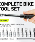 Hand holding Dialed In Bike Torque Wrench Set For One Quarter Inch Drive With 2 To 20 Nm Range, showing hex and Torx bits