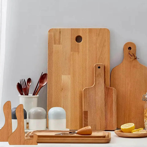 DIYers Friendly Acrylic Cutting Board And Charcuterie Board Stand Templates With Router Guides And Tracing Stencils For Woodworking, Clear, Reusable, Durable Templates For Perfect Placement In The Kitchen next to wooden cutting boards.