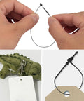 Hands using Clear 3 Inch Plastic Fasteners 500 Pack For Retail Hang Tags And Price Tags With Snap Lock Pins on items.