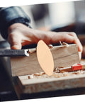 100 Pack Hella Strong Beech Wood Joiner Biscuits For Heavy Duty Woodworking and Furniture Assembly being inserted into wood.