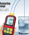 Red handheld digital thermocouple thermometer with four K-type probes; LCD shows 25.8°C / 43.2°F near a glass of ice water.