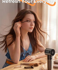 Woman using handheld portable fan with 6 speeds, tiny but mighty mini personal fan, 5000mAh rechargeable battery, LED display