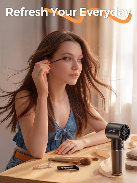 Woman using handheld portable fan with 6 speeds, tiny but mighty mini personal fan, 5000mAh rechargeable battery, LED display
