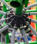 Close-up of 10-pack stainless steel hose clamps, 3/4 in, securing gray hoses to a green central hub