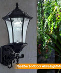 Solar Wall Lantern Outdoor Wireless Dusk To Dawn Light With 21 Inch Large LED Wall Sconce Fixture In Clear Glass And Aluminum Housing Weatherproof Two Pack, mounted on wall showcasing cool white light mode with garden view
