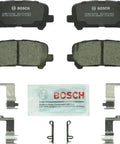 Bosch QuietCast ceramic rear brake pad set (4 pads) with hardware clips and lubricant.